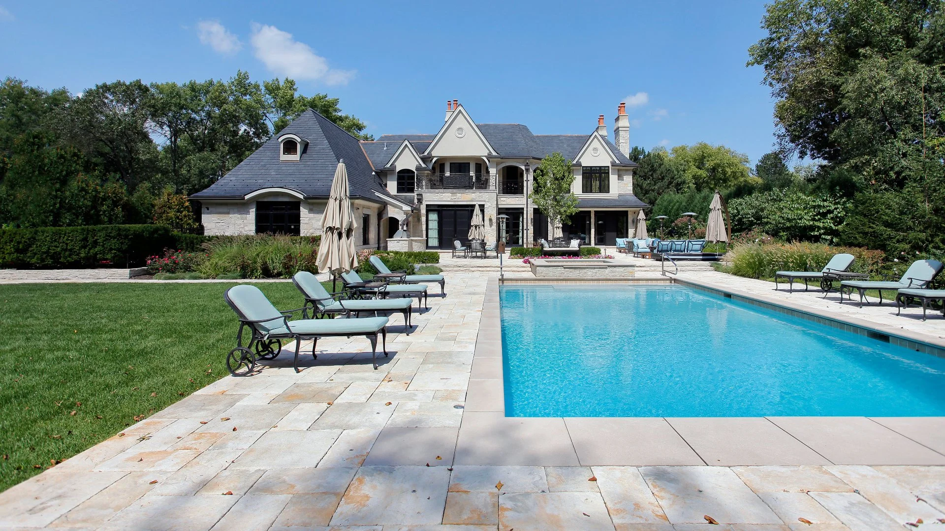 Large pool home in Bridgehampton, NY with beautiful pool deck.
