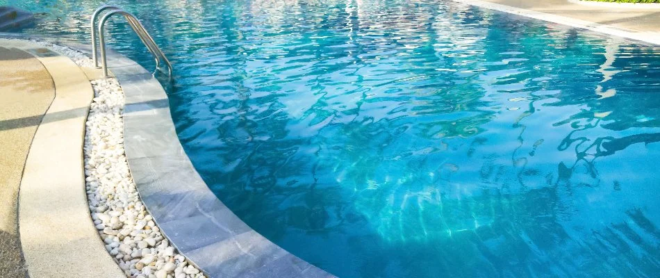 Pool in Tuckahoe, NY, with rocks around the edge.