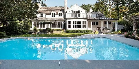 White luxury pool home in Bridgehampton, NY.