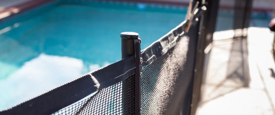 Fence around a pool in Bridgehampton, NY.