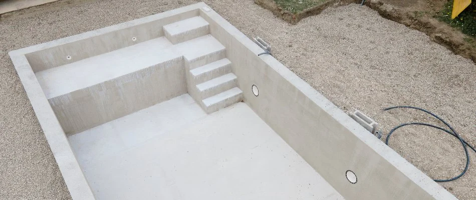 Pool in Bridgehampton, NY, in the process of being installed.