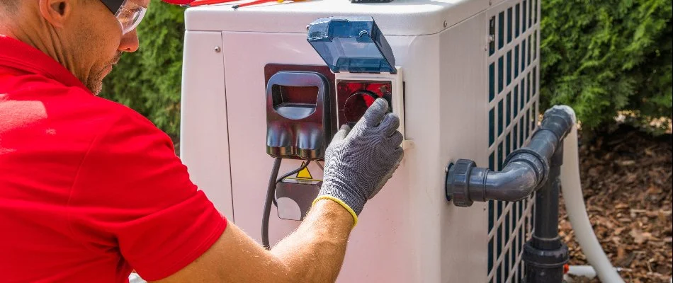 A pool heater system in Bridgehampton, NY, being maintained.