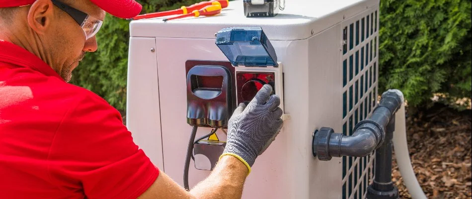 Professional repairing heater system for a pool in Bridgehampton, NY.